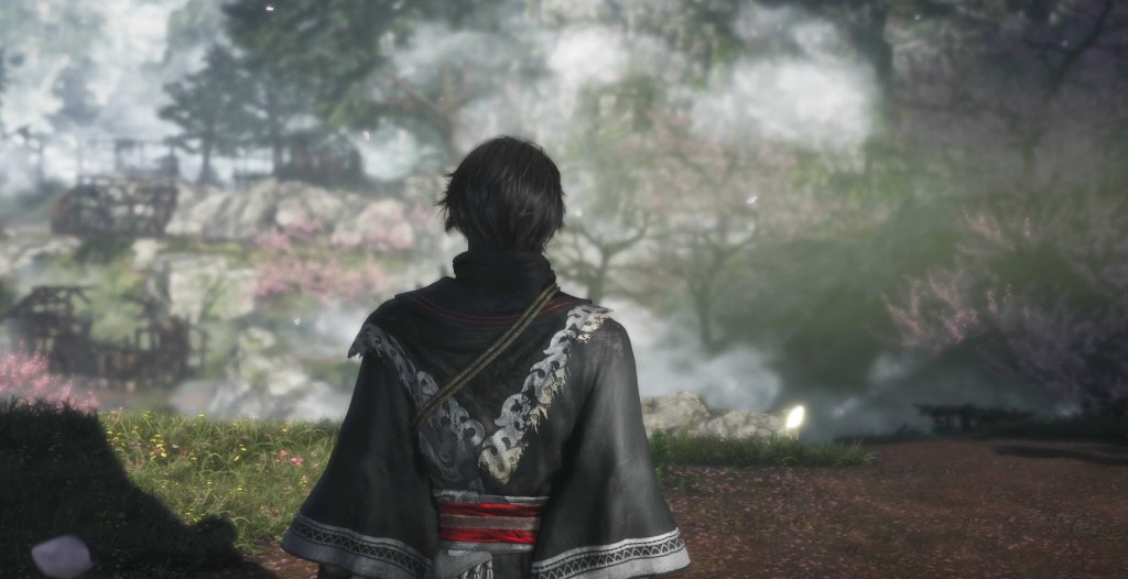 Wanderer looking off into the distance at a village in Dynasty Warriors: Origins