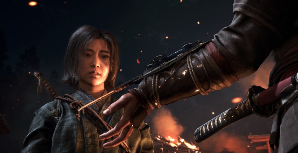 Naoe receiving the hidden blade during the prologue